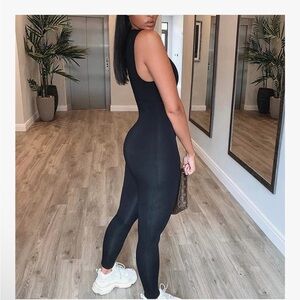 OQQ NIP L Black Sleeveless ZIPPER BACK MOCK NECK YOGA or anytime Jumpsuit